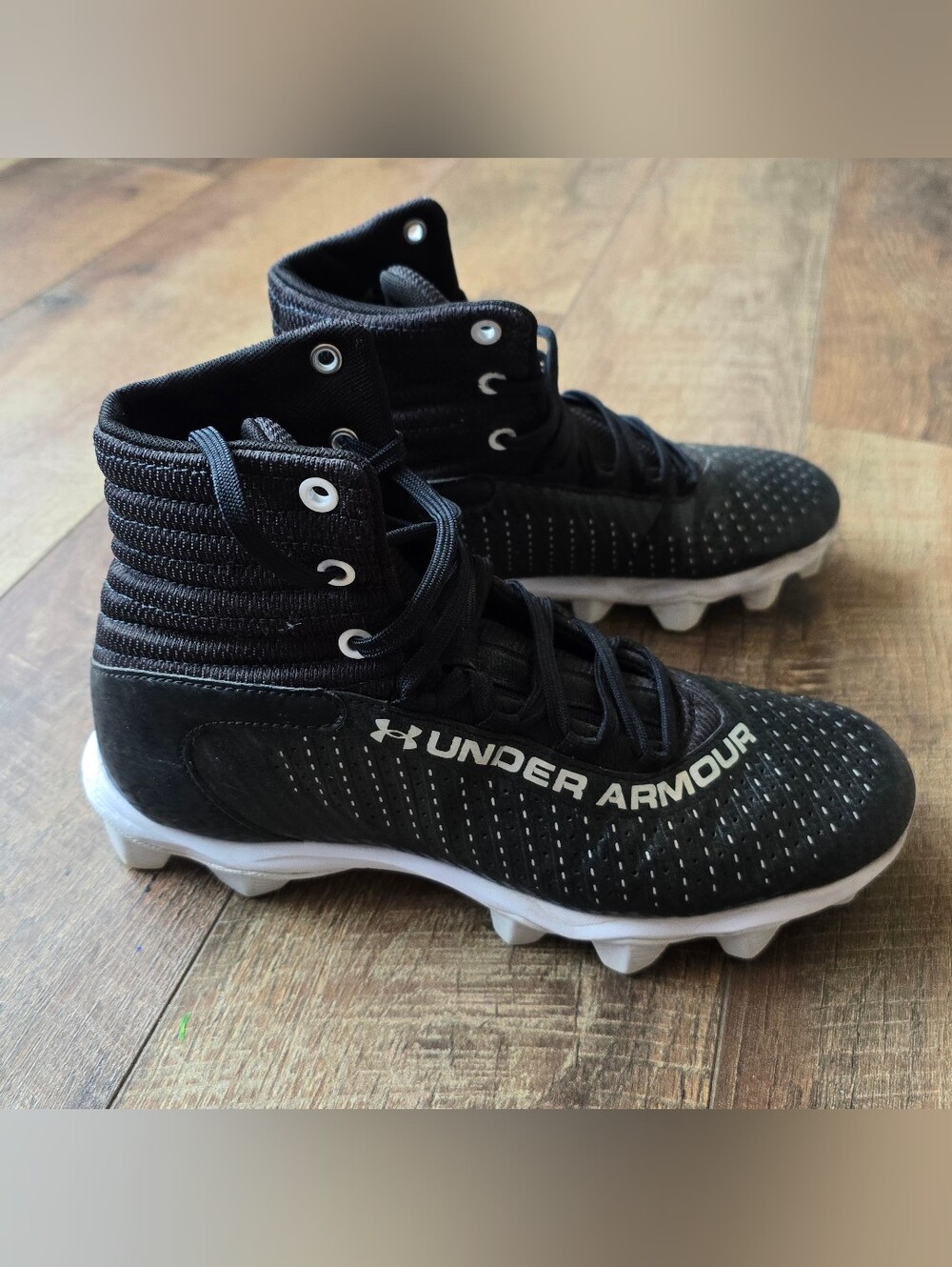 Under Armour Black and White High-Top Football Cleats